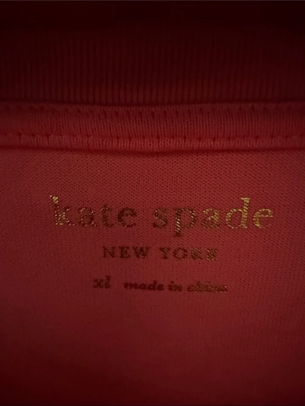 kate spade coral peplum top with white trim ruffles